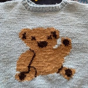 Gently used HANDMADE baby sweater . About‎ a size 5